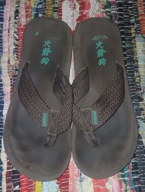 Rocket Dog Brown Flip Flops with Teal Logo Condition Issues On Bottom
